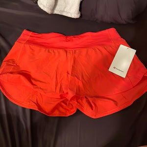 Lululemon coral shorts size 8 brand new with tags!